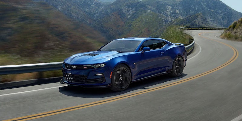 2021 Chevrolet Camaro driving on a winding mountain road