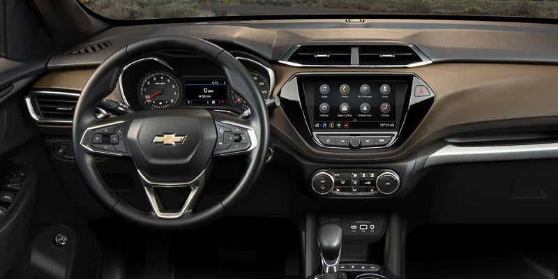 Trailblazer interior view showing steering wheel and infotainment system