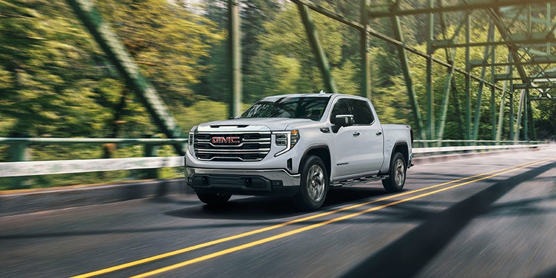 2026 GMC Sierra 1500 cruising through the roads